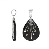 Sterling silver teardrop pendant with polished black shell and flowing silver wire accents – handcrafted artisan jewelry for women.